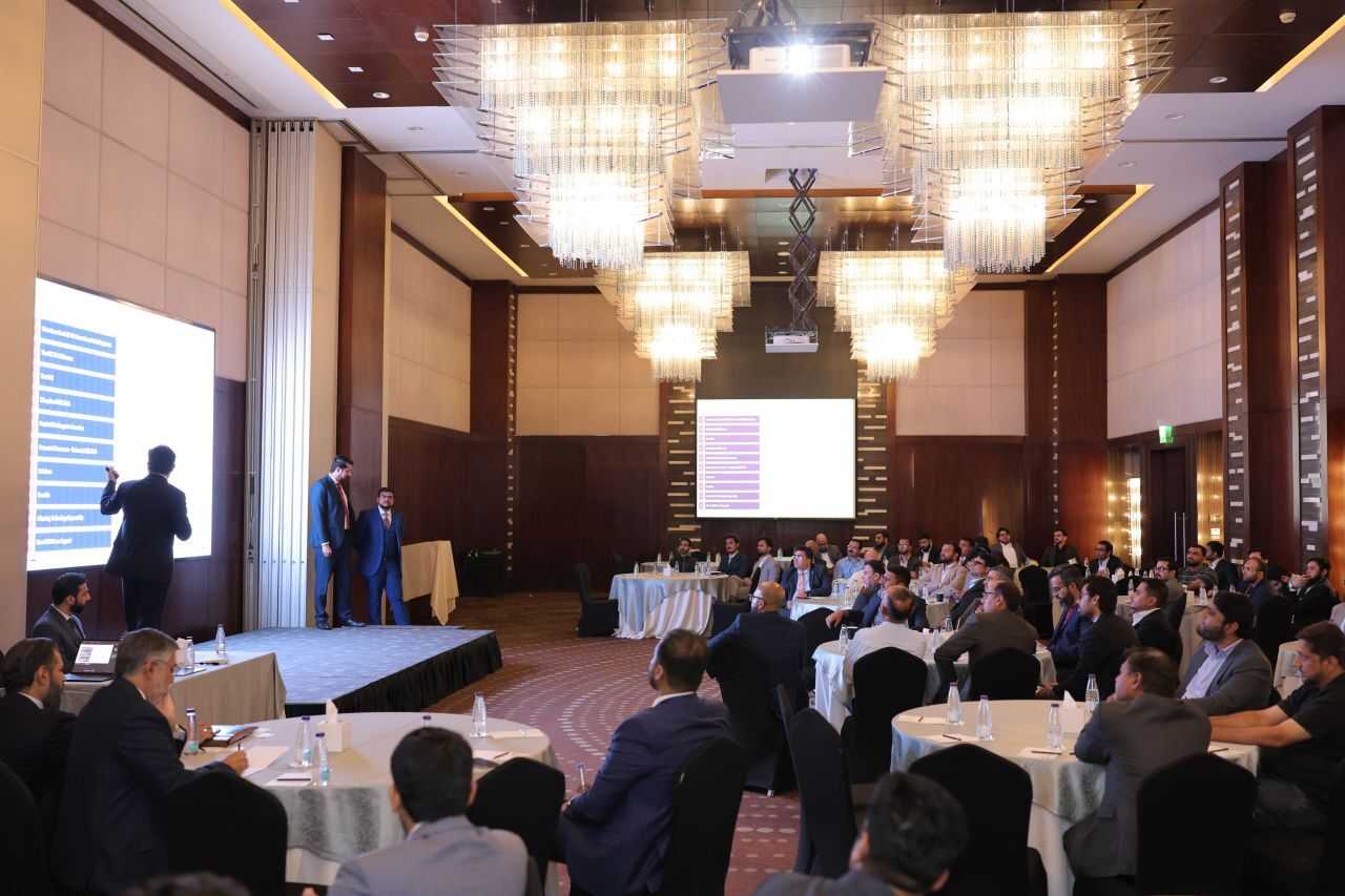 Presenter addressing attendees during the session